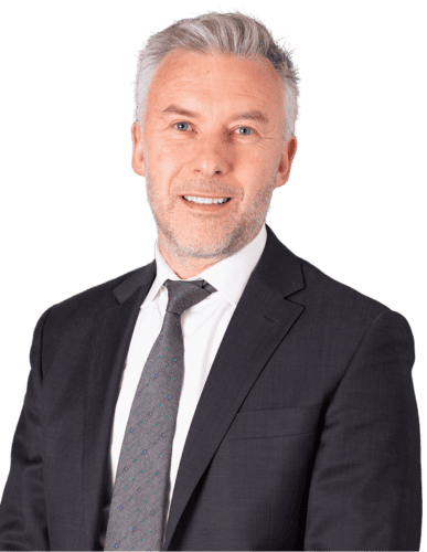 Showing Robert Sestan offering custom finance guidance in business attire